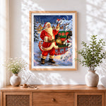 Finished classic santa with sleigh, lantern and red cardinals cross stitch artwork displayed