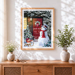 Finished classic snowman by a red door cross stitch artwork displayed