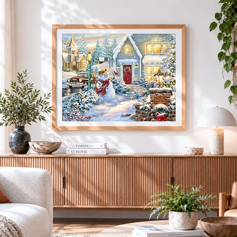 Finished classic snowman outside the house cross stitch artwork displayed