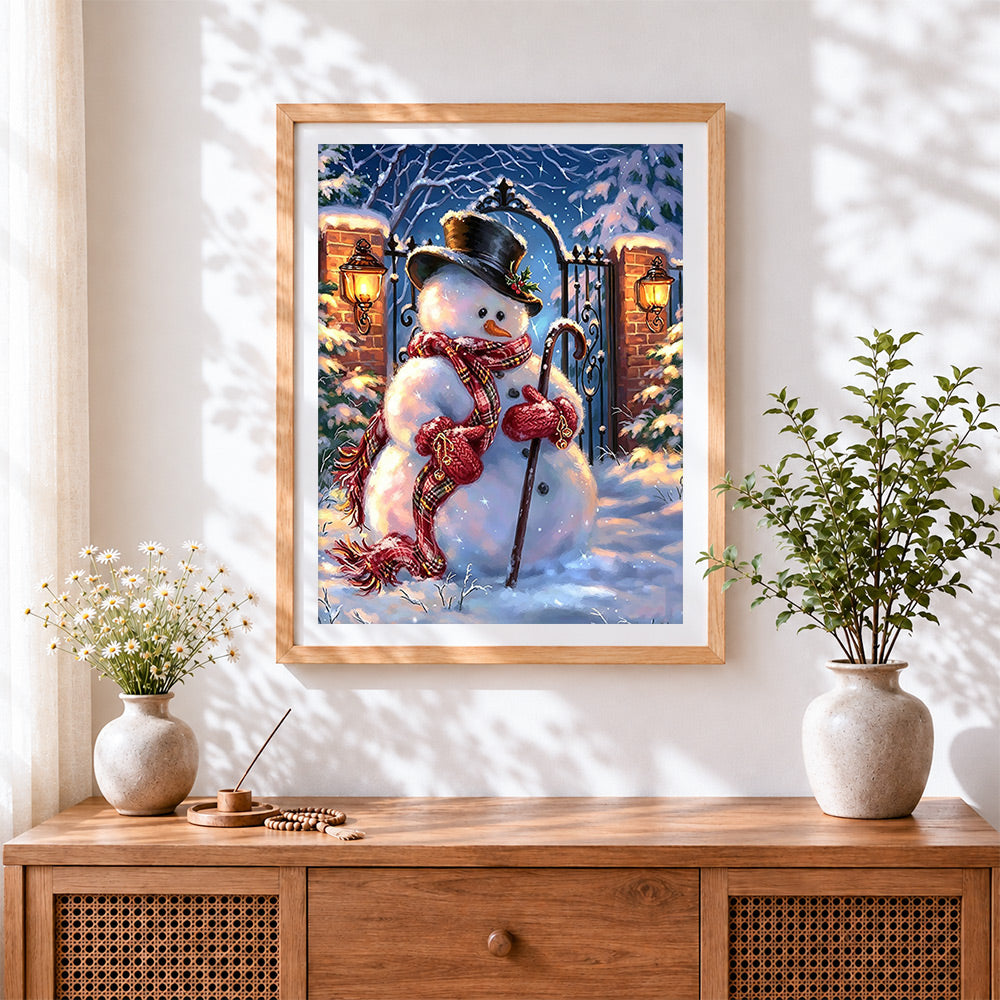 Finished classic snowman with top hat cross stitch artwork displayed