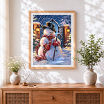 Finished classic snowman with top hat cross stitch artwork displayed