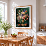 Classical floral still life with fruit and gold urn cross stitch artwork displayed on wall as home decor