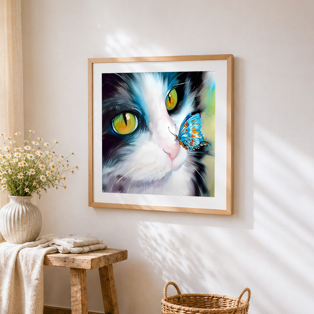 Close-up cat with a blue butterfly cross stitch artwork displayed on wall as home decor