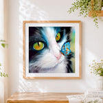Finished close-up cat with a blue butterfly paint by numbers artwork displayed as home decor