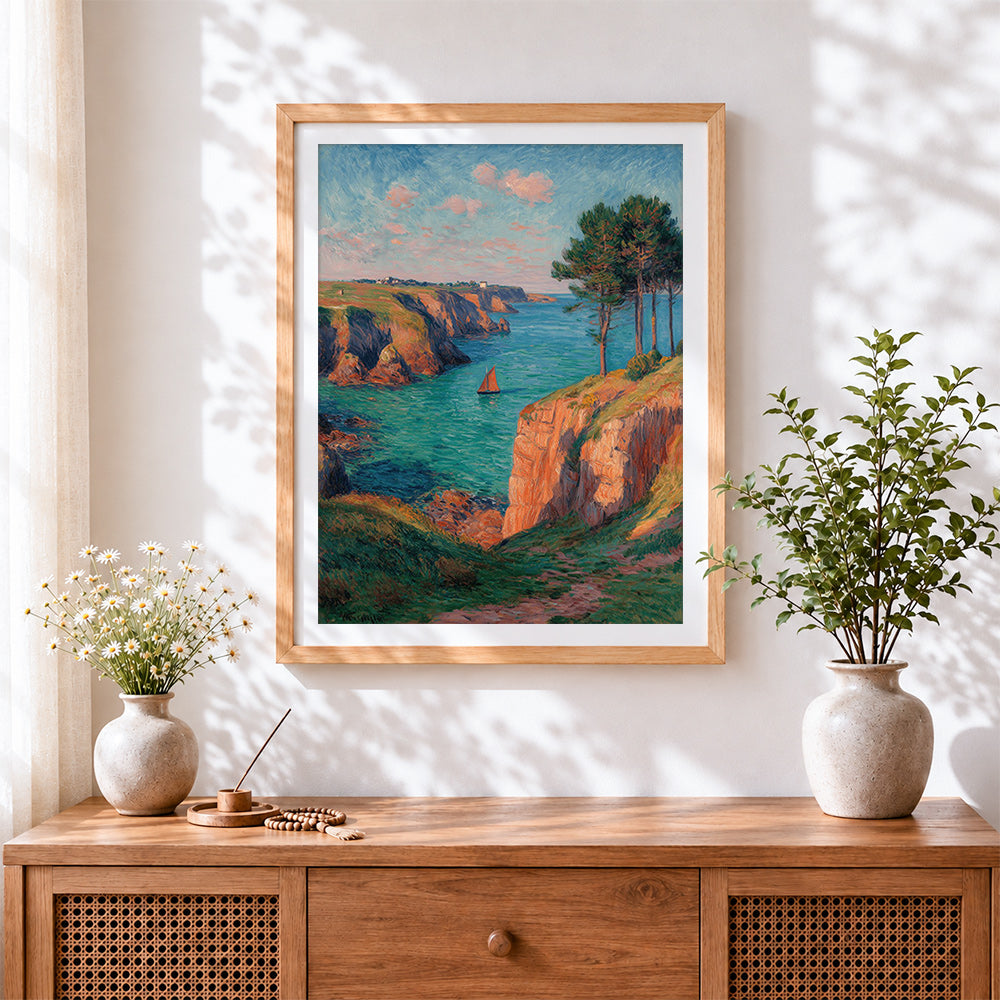 Finished coastal cliffs and sailboat cross stitch artwork displayed