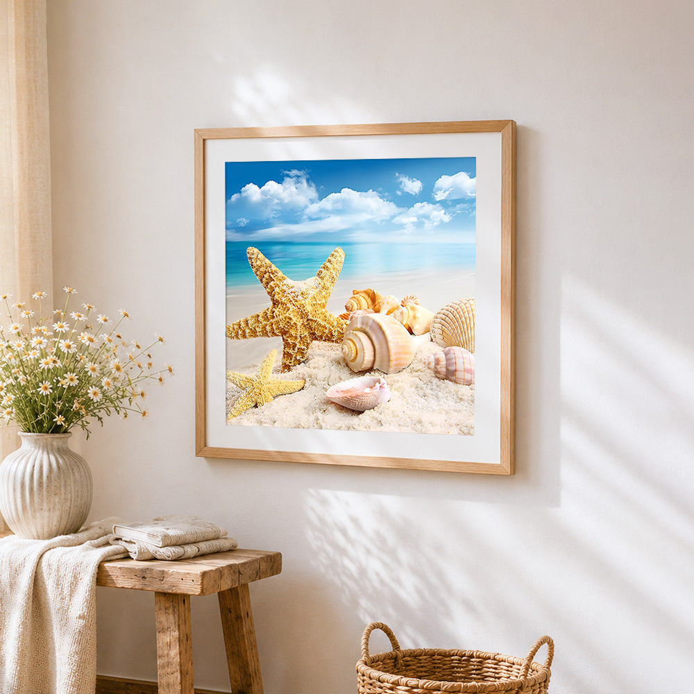 Coastal starfish and seashells on the beach paint by numbers artwork displayed on wall as home decor