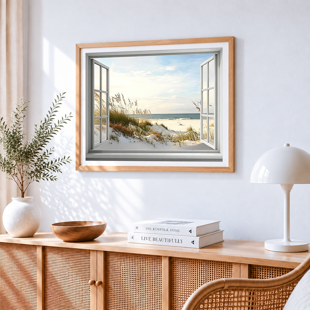 Coastal view through open window cross stitch artwork displayed on wall as home decor