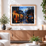 Finished cobblestone street at night cross stitch artwork displayed