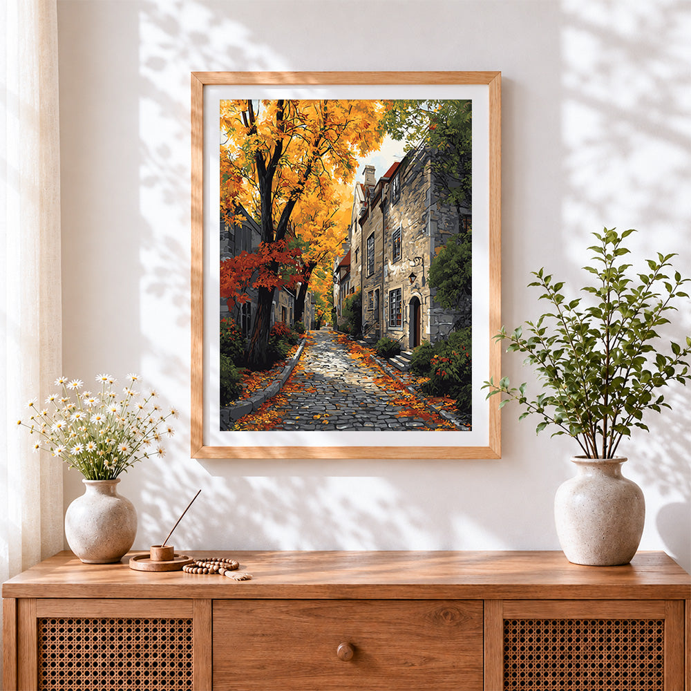Finished cobblestone street in autumn cross stitch artwork displayed
