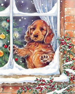 Cocker spaniel puppy looking out a snowy window cross stitch kit for beginners