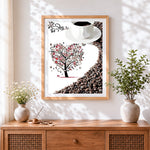 Finished coffee cup and heart tree cross stitch artwork displayed