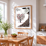 Coffee cup and heart tree cross stitch artwork displayed on wall as home decor