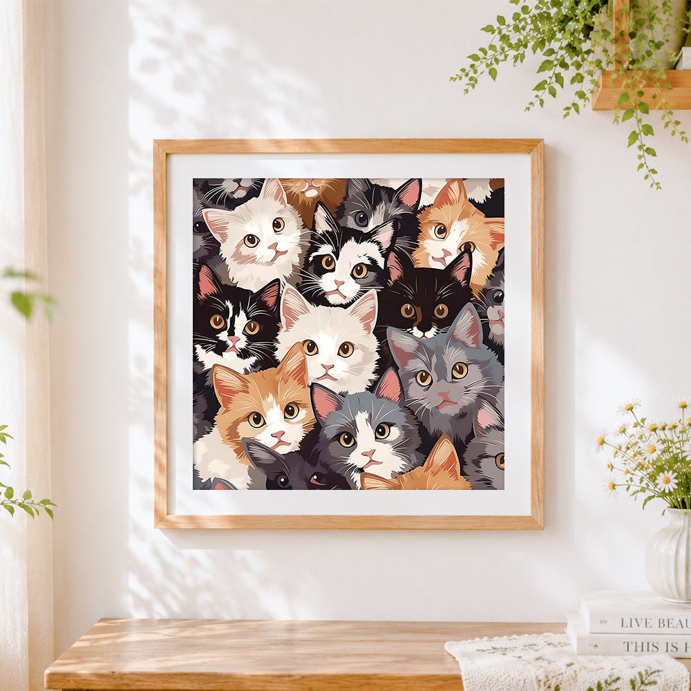 Finished collage of cute cats cross stitch artwork displayed