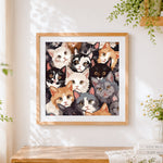 Finished collage of cute cats cross stitch artwork displayed