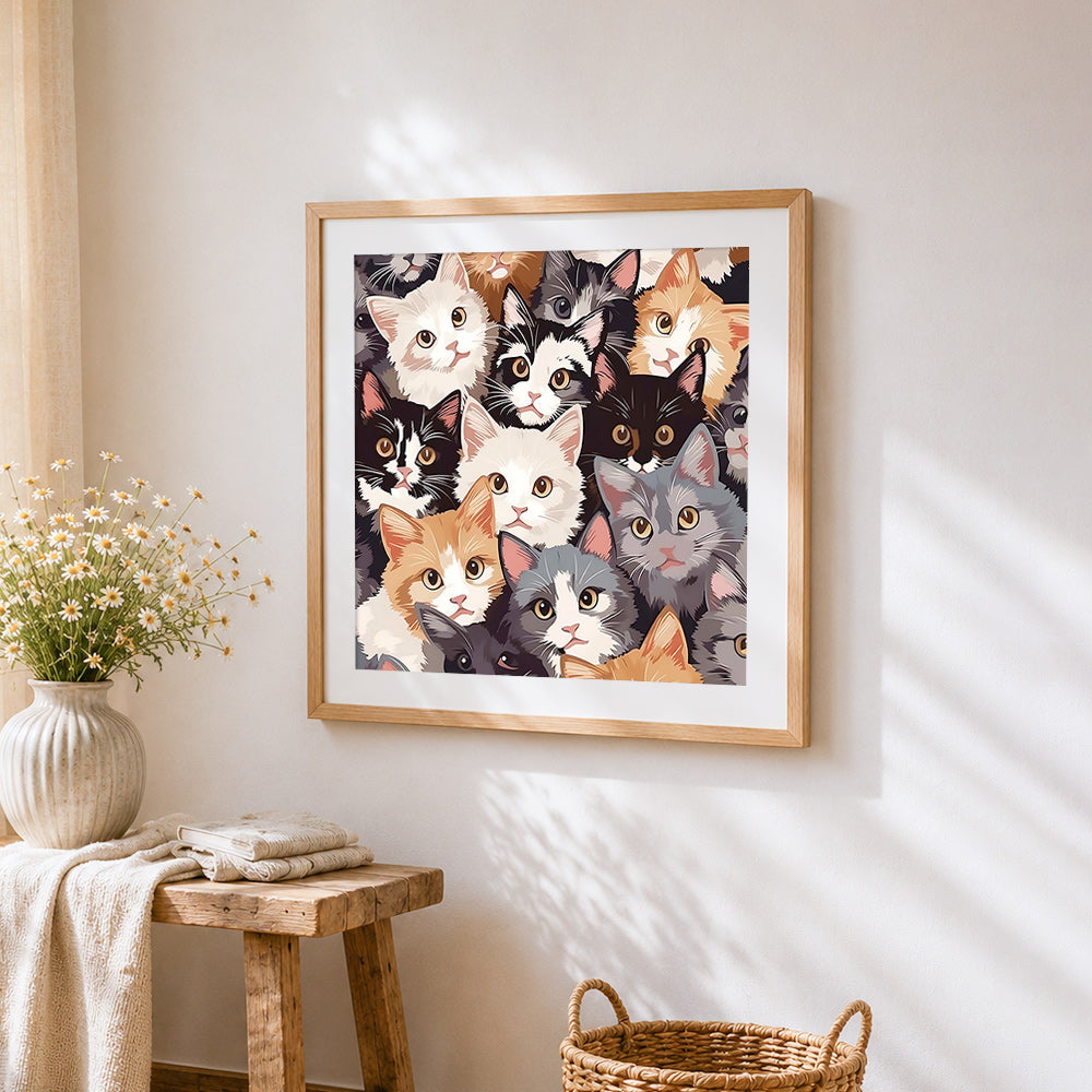Collage of cute cats cross stitch artwork displayed on wall as home decor