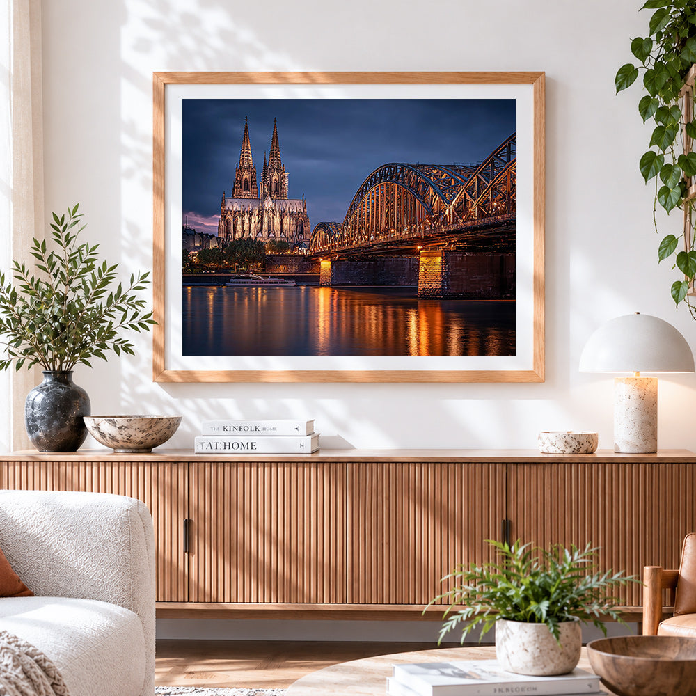 Finished cologne cathedral and bridge at night cross stitch artwork displayed