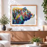 Finished colourful abstract bear cross stitch artwork displayed