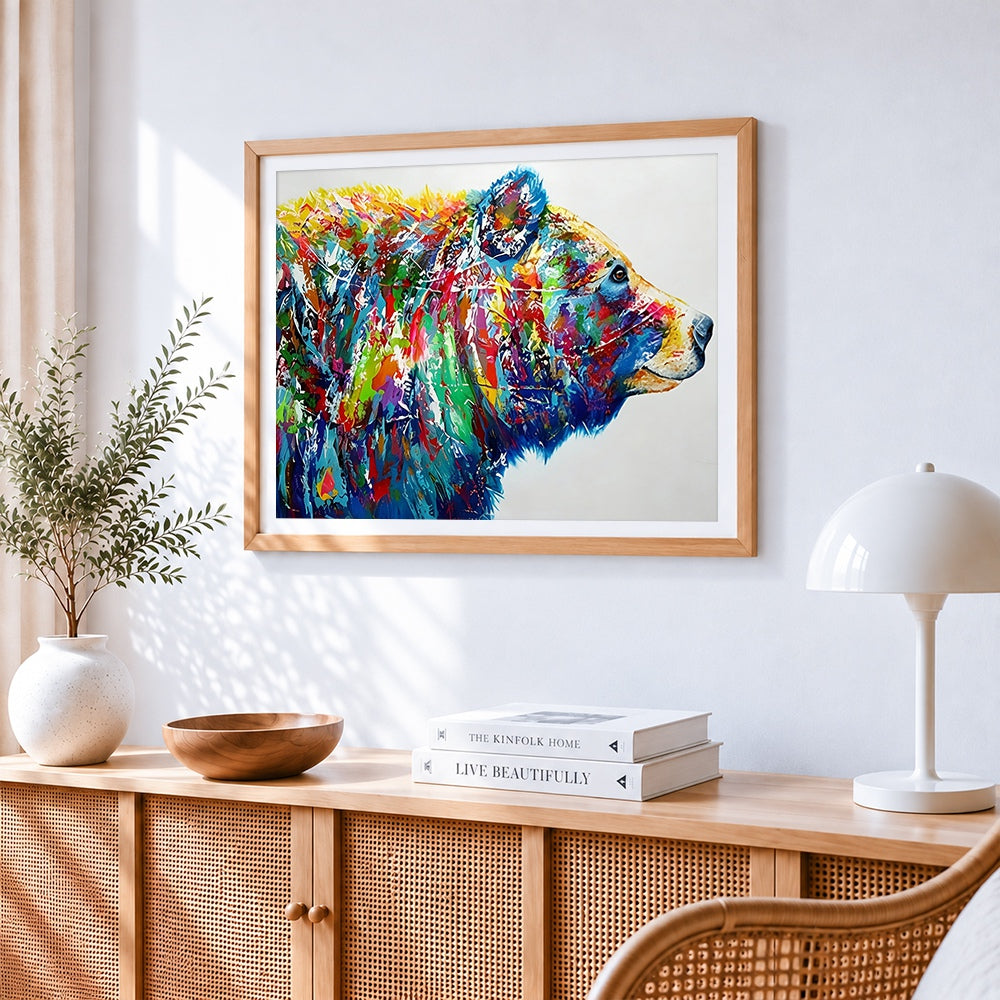 Colourful abstract bear cross stitch artwork displayed on wall as home decor