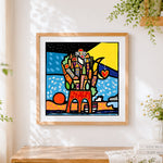 Finished colourful abstract cityscape cross stitch artwork displayed