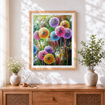 Finished colourful abstract dandelion cross stitch artwork displayed
