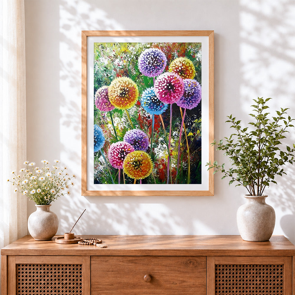 Finished colourful abstract dandelion cross stitch artwork displayed