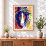 Finished colourful abstract horse cross stitch artwork displayed