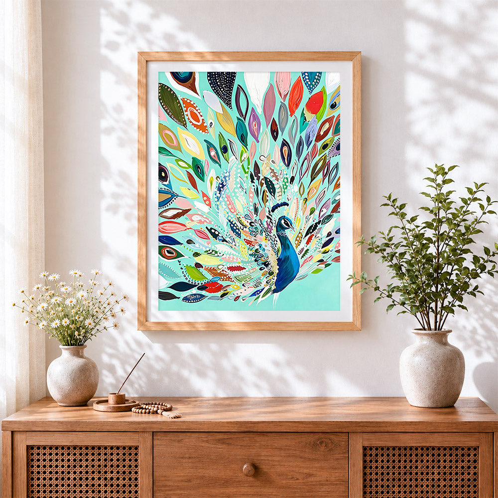 Finished colourful abstract peacock cross stitch artwork displayed