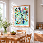 Colourful abstract peacock cross stitch artwork displayed on wall as home decor