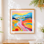 Finished colourful abstract rolling hills cross stitch artwork displayed