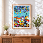 Finished colourful abstract village and swirl tree cross stitch artwork displayed