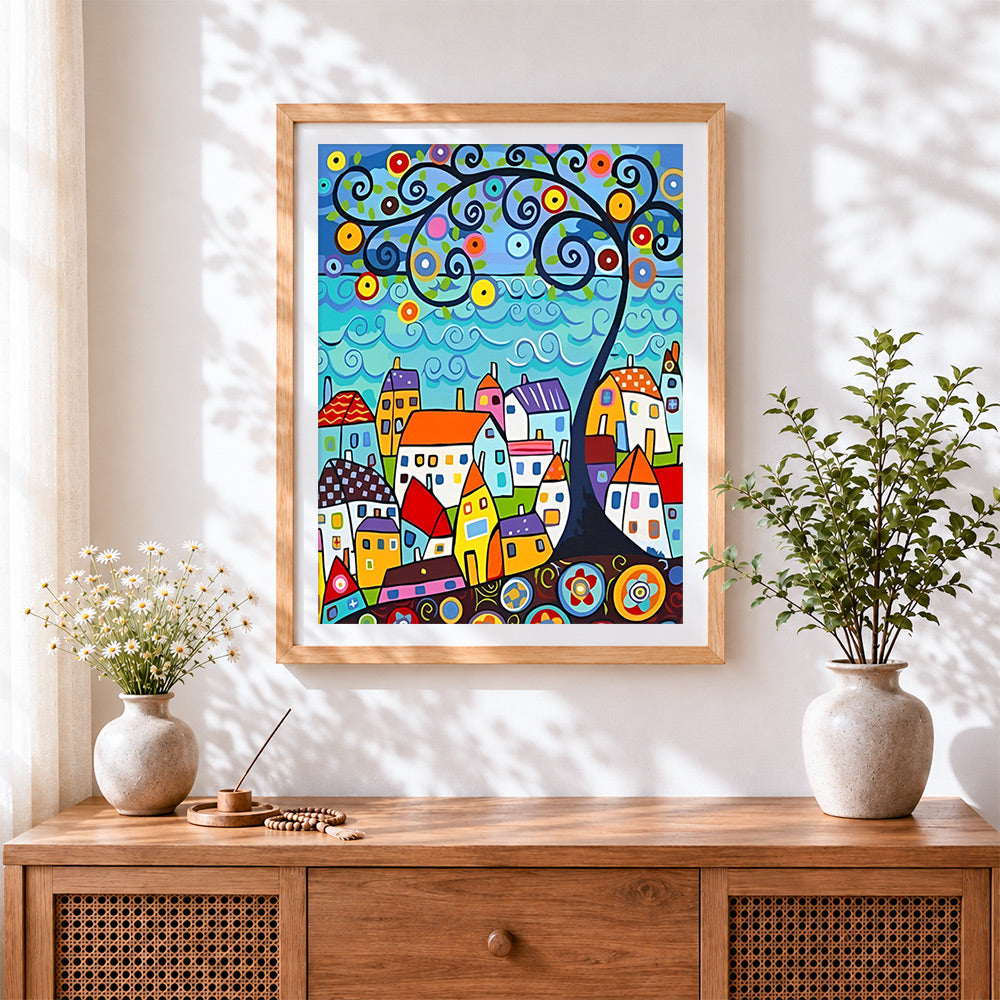 Finished colourful abstract village and swirl tree cross stitch artwork displayed