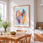 Colourful angel wings cross stitch artwork displayed on wall as home decor