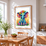 Colourful baby elephant with floral crown cross stitch artwork displayed on wall as home decor