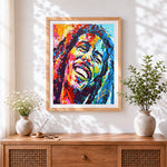 Finished colourful bob marley portrait cross stitch artwork displayed