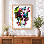 Finished colourful butterflies on the skull cross stitch artwork displayed