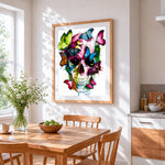Colourful butterflies on the skull cross stitch artwork displayed on wall as home decor