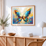 Colourful butterfly in flight cross stitch artwork displayed on wall as home decor