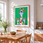 Colourful cartoon giraffes cross stitch artwork displayed on wall as home decor