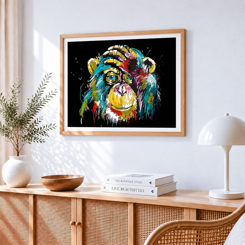 Colourful chimpanzee portrait paint by numbers artwork displayed on wall as home decor