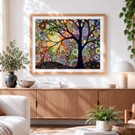 Finished colourful circle tree cross stitch artwork displayed