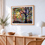 Colourful circle tree cross stitch artwork displayed on wall as home decor