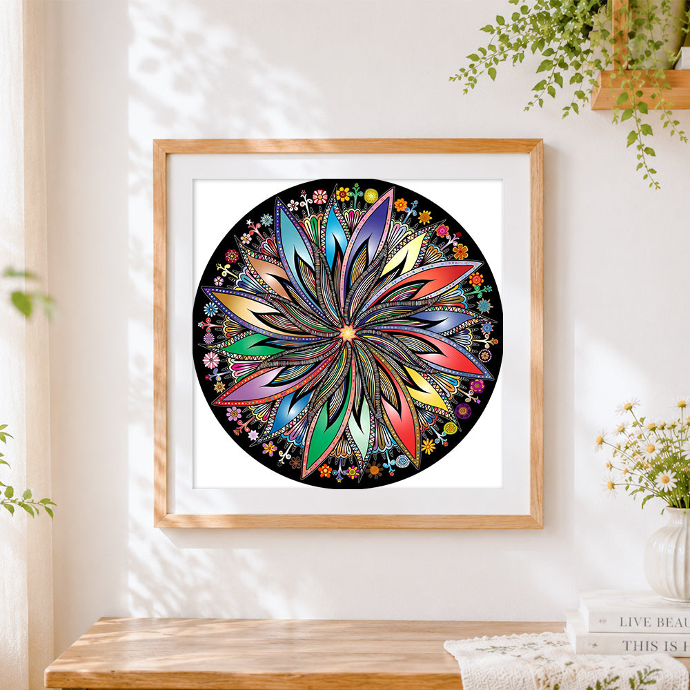 Finished colourful circular mandala cross stitch artwork displayed