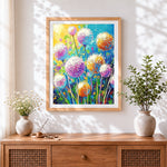 Finished colourful dandelions cross stitch artwork displayed