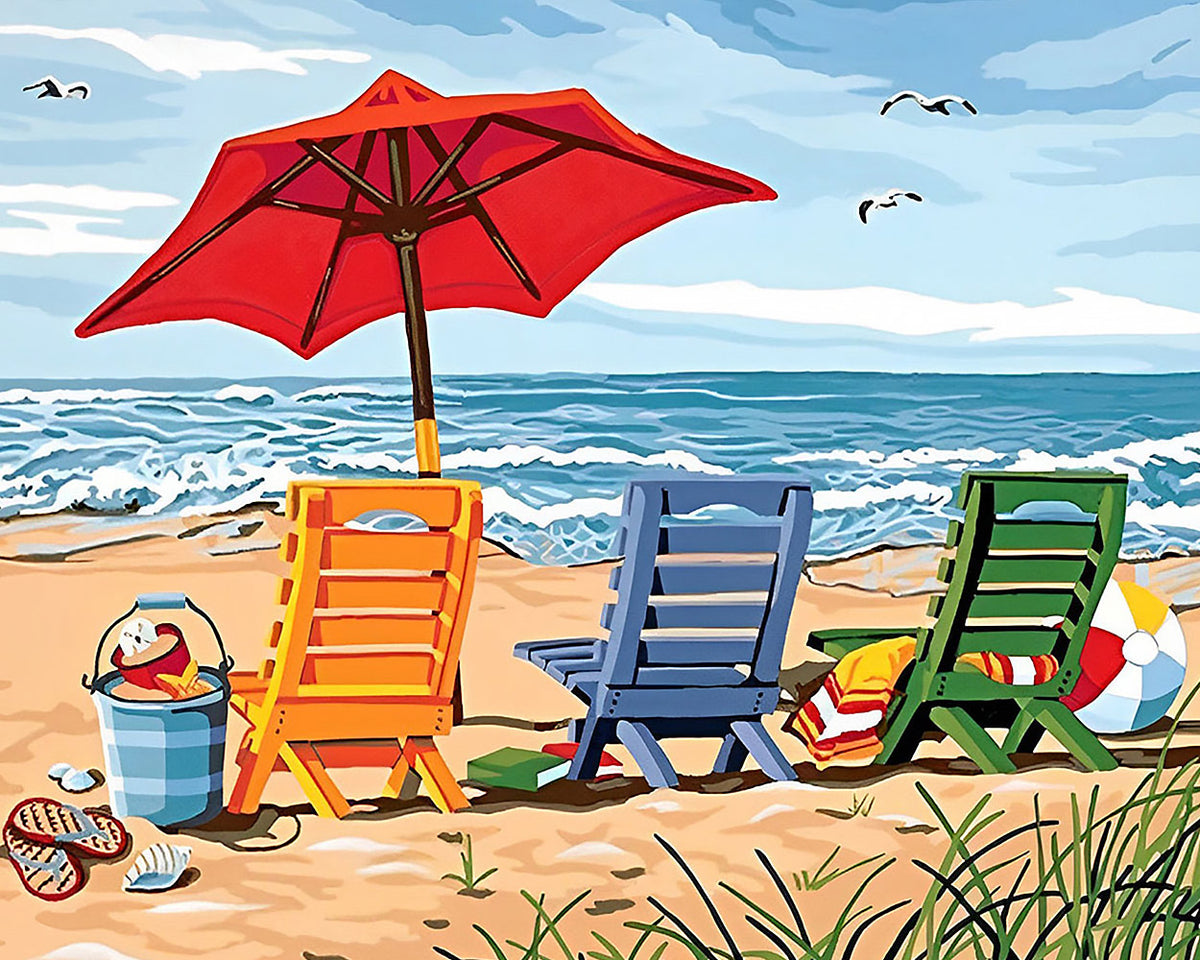 Colourful deck chairs on a sandy beach cross stitch kit for beginners