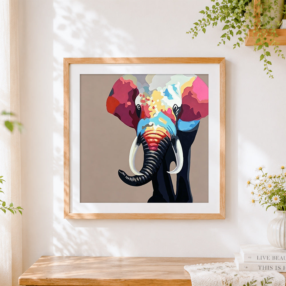 Finished colourful elephant portrait cross stitch artwork displayed