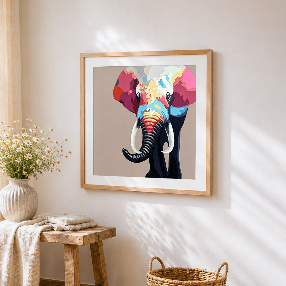 Colourful elephant portrait cross stitch artwork displayed on wall as home decor
