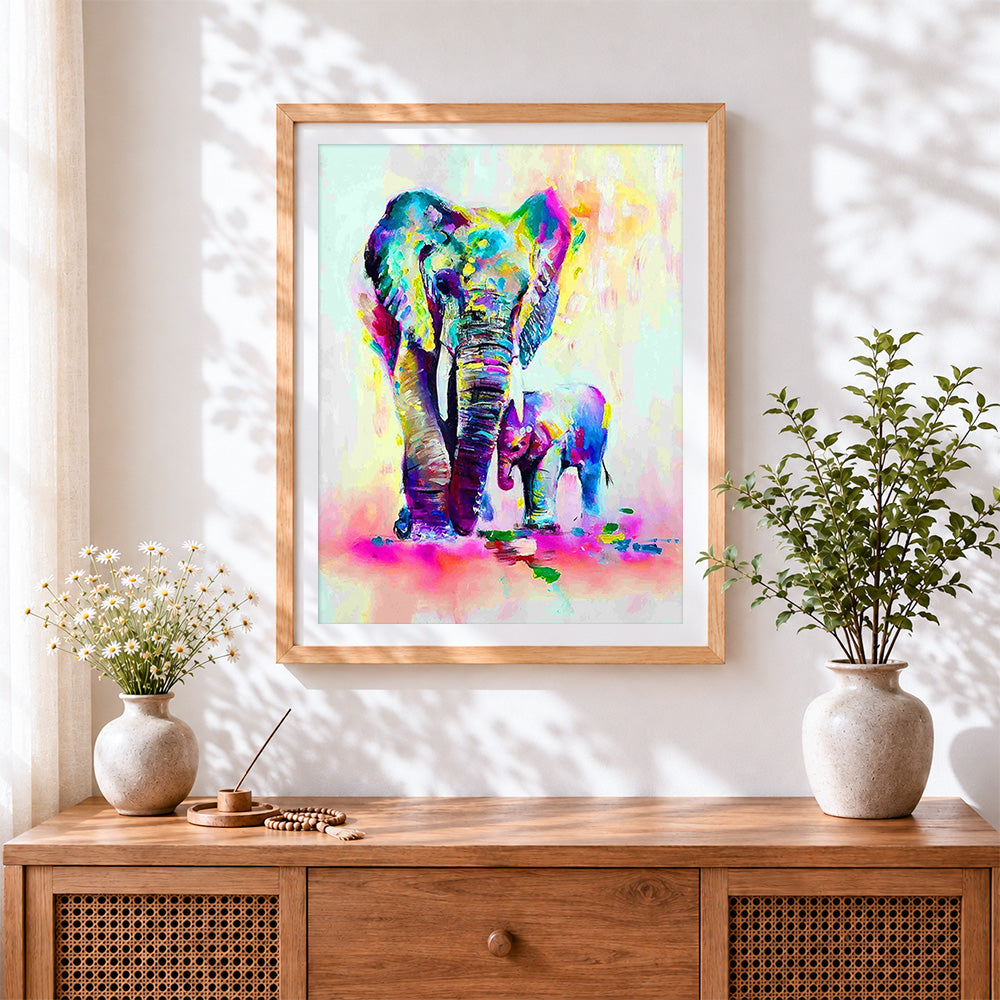 Finished colourful elephants with baby cross stitch artwork displayed