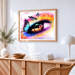 Colourful eye with butterflies paint by numbers artwork displayed on wall as home decor