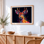 Colourful fawn on dark background paint by numbers artwork displayed on wall as home decor