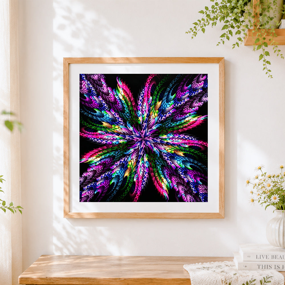 Finished colourful feather burst mandala cross stitch artwork displayed